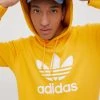 Ανδρικά Χωρίς φερμουάρ Βαμβακερή μπλούζα Adidas Originals Adicolor χρώμα: κίτρινο